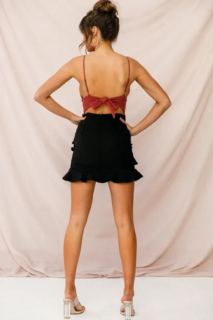 Black Mini Skirt with Tiered Ruffle Detail and Flounce Hem